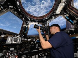 Astronaut Insights: 25 Years in Low Earth Orbit NASA astronaut Matthew Dominick points his camera through a cupola window as the International Space Station orbits 262 miles above the Atlantic Ocean off the coast of Africa.