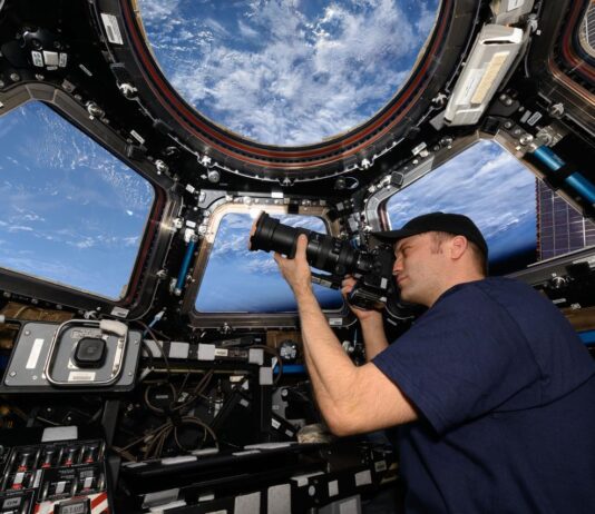 Astronaut Insights: 25 Years in Low Earth Orbit NASA astronaut Matthew Dominick points his camera through a cupola window as the International Space Station orbits 262 miles above the Atlantic Ocean off the coast of Africa.