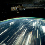 NASA Explores Earth’s Surface from Above City lights on Earth appear as bright streaks in this long-exposure photo. Earth