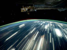 NASA Explores Earth’s Surface from Above City lights on Earth appear as bright streaks in this long-exposure photo. Earth