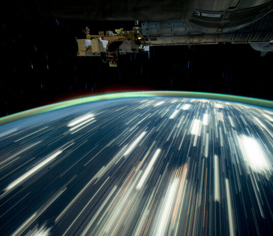 NASA Explores Earth’s Surface from Above City lights on Earth appear as bright streaks in this long-exposure photo. Earth
