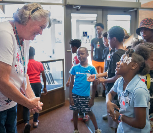 Middle School Students Invited by NASA to Explore STEM Careers A group of grade school students explore the lobby of NASA Glenn