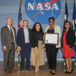 Portia Keyes Secures Essential NASA Support in Starlight Mission A NASA employee receives an award from four of her colleagues.
