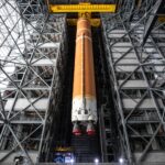 NASA Starts Vertical Assembly of Artemis II Core Stage The fully assembled SLS (Space Launch System) core stage for the Artemis II test flight is suspended 225 feet in the air inside the newly renovated High Bay 2 at Kennedy’s Vehicle Assembly Building. The core stage was lifted to enable engineers to complete work before it is stacked on mobile launcher 1 with other rocket elements. With the move to High Bay 2, technicians now have 360-degree tip to tail access to the core stage, both internally and externally.
