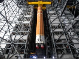 NASA Starts Vertical Assembly of Artemis II Core Stage The fully assembled SLS (Space Launch System) core stage for the Artemis II test flight is suspended 225 feet in the air inside the newly renovated High Bay 2 at Kennedy’s Vehicle Assembly Building. The core stage was lifted to enable engineers to complete work before it is stacked on mobile launcher 1 with other rocket elements. With the move to High Bay 2, technicians now have 360-degree tip to tail access to the core stage, both internally and externally.