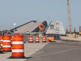 NASA’s New Bridge to Support U.S. Space Initiatives Image shows cars driving on a recently opened road that was under construction
