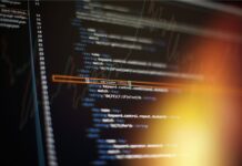 Understanding The Differences Between NTFS and Ext4 in Ubuntu File System Close-up of computer code on a screen.