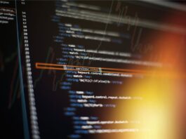 Understanding The Differences Between NTFS and Ext4 in Ubuntu File System Close-up of computer code on a screen.