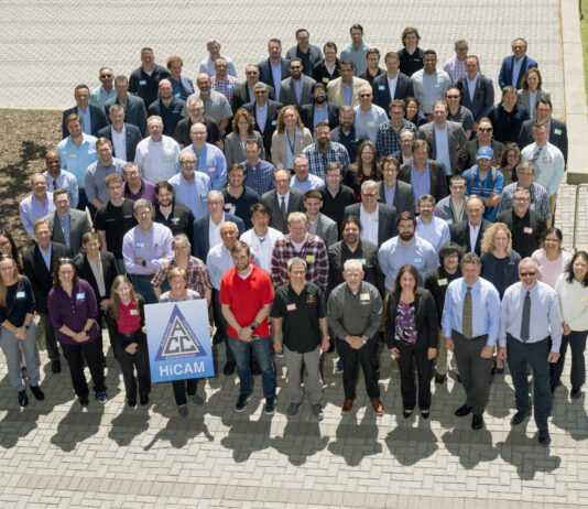 NASA’s Spring 2025 Review: High-Rate Composite Aircraft Project A large group of people who work on composite aircraft pose outside in a parking lot.
