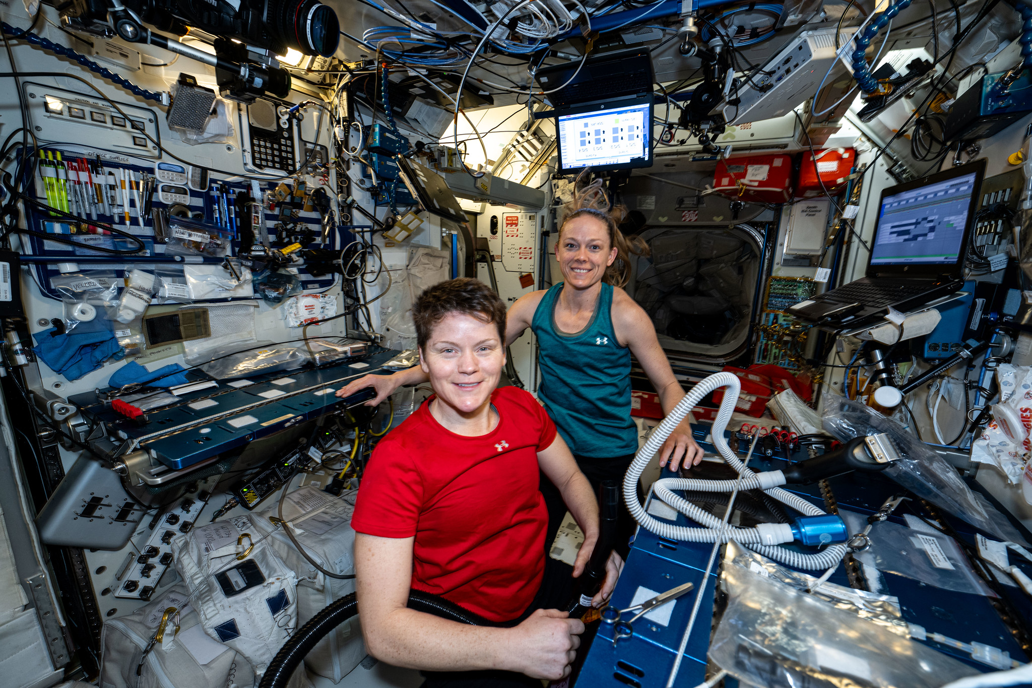 mcclain and ayers on iss june downlinks.jpg NASA astronauts (left to right) Anne McClain and Nichole Ayers, pose for a portrait together aboard the International Space Station. Moments earlier, Ayers finished trimming McClain