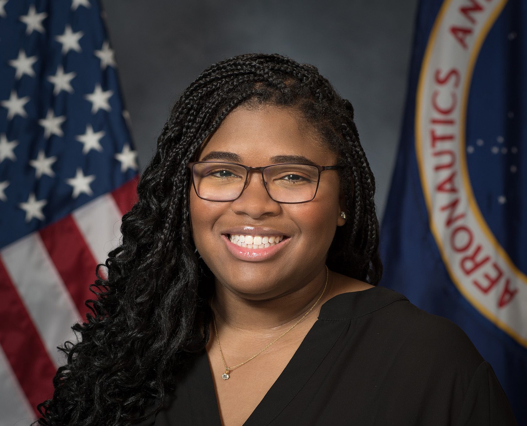 mcmillon brown lyndsey flag e1739365865925.jpg Portrait of Dr. Lyndsey McMillon-Brown