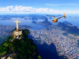Microsoft Flight Simulator Unveils World Update XIX: South America An orange helicopter flies above Rio de Janeiro.