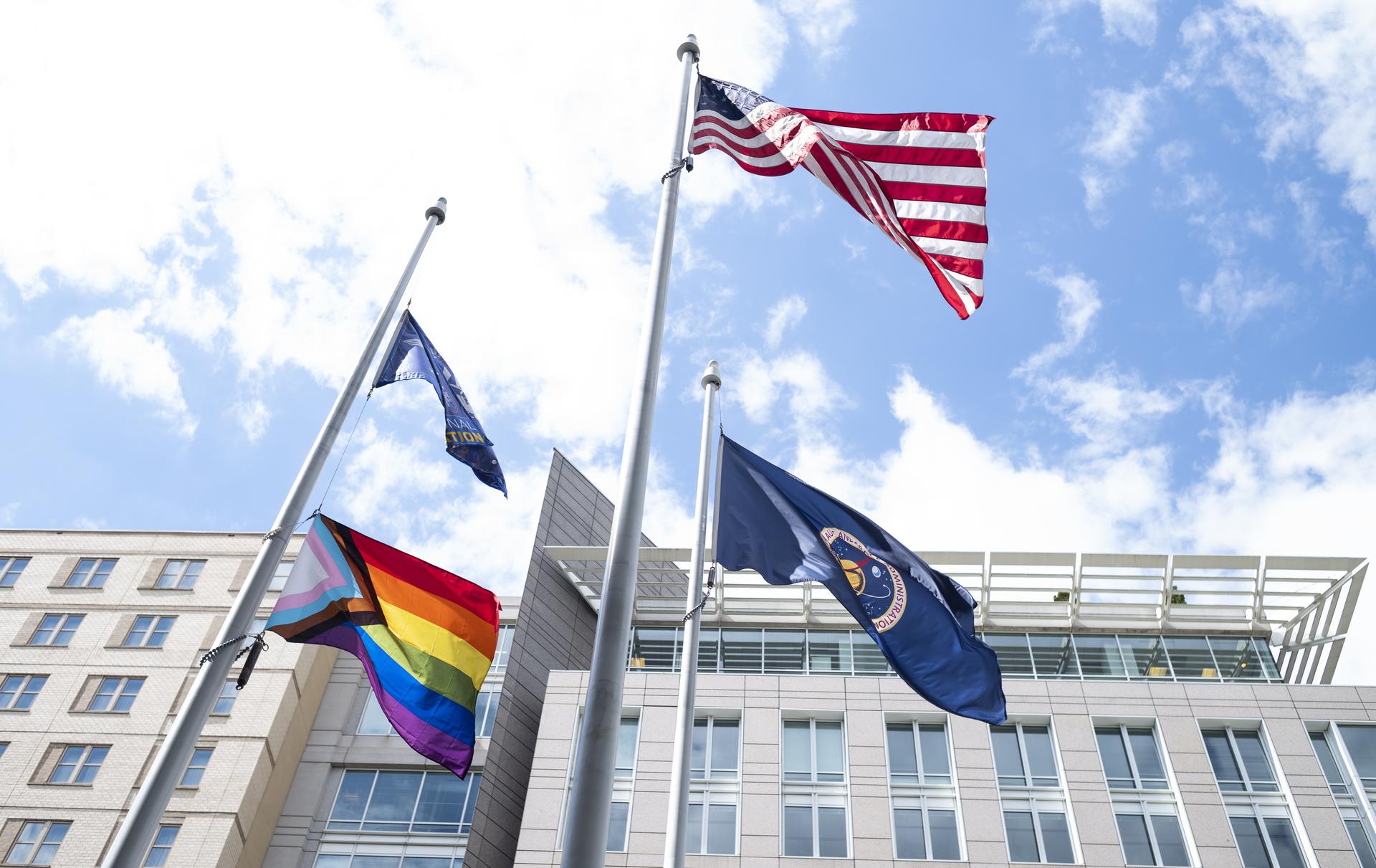 nasa hq flags.jpg The Progress Pride flag is seen flying at the Mary W. Jackson NASA Headquarters Building, June 9, 2022, in Washington.