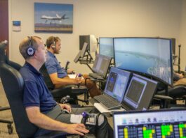NASA Offers Software Solutions Directly to Innovators Andy Burroughs (left) and Paul Friz in the roles of air taxi pilots running through air taxi integration simulations focusing on urban air space at NASA’s Langley Research in Hampton, Virginia on Sept. 25, 2024.