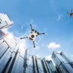 Charting Flight Paths for Drones in Controlled Airspace Autonomous vehicle drones in flight among city buildings.