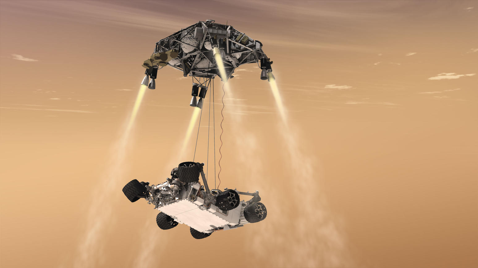 pia14839.jpg An artist’s concept of the 2012 Mars Curiosity Landing using the skycrane maneuver, with the rover hanging below the hovering spacecraft via three nylon tethers.