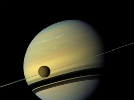 Key Facts About NASA Lewis’ Final Cassini Launch The yellowish-blue planet Saturn with its Titan moon in the foreground.