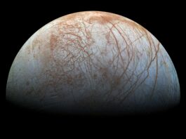 NASA’s Europa Clipper Investigates Potential Life on Frozen Moon Europa looms large in this reprocessed color view