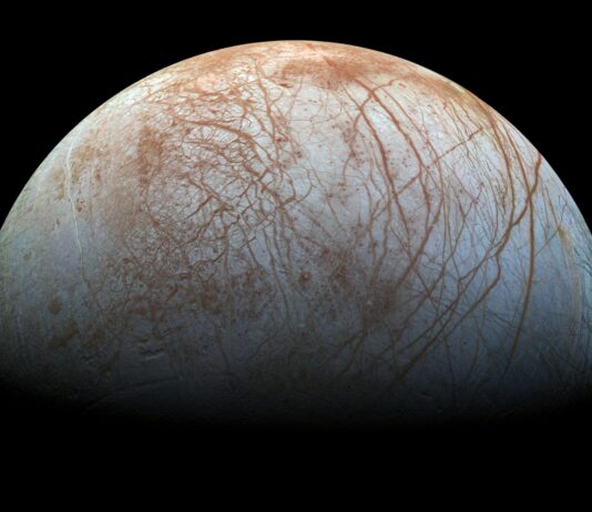 NASA’s Europa Clipper Investigates Potential Life on Frozen Moon Europa looms large in this reprocessed color view