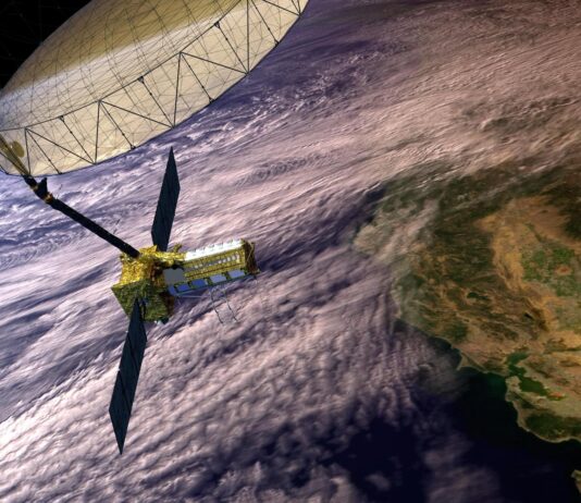 NASA Highlights Upcoming US-India Radar Mission Preview A satellite with gold metallic accents orbits the cloudy Earth.