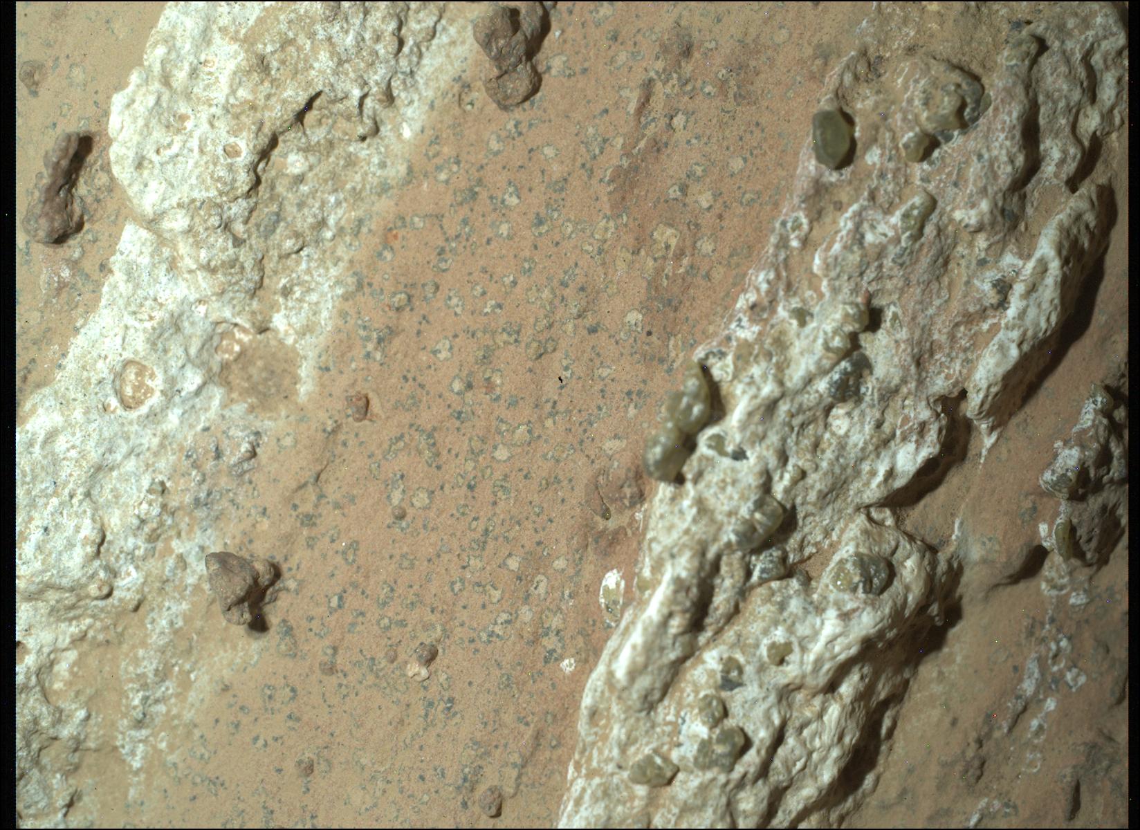 pia26368orig.jpg Picture of the red-brown Mars terrain, which is spotted with tan and dark gray