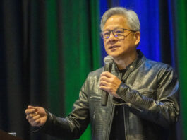 NVIDIA Chief Honored for Boosting Precision Medicine with AI nvidia ceo jensen huang speaking at precision medicine world conference