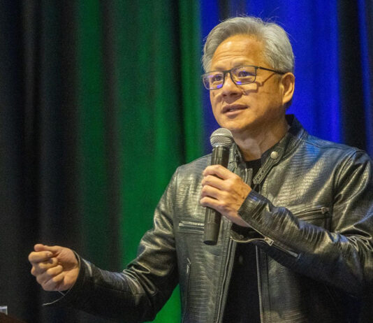 NVIDIA Chief Honored for Boosting Precision Medicine with AI nvidia ceo jensen huang speaking at precision medicine world conference