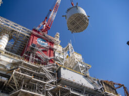 NASA’s November 2024 Highlight: A Special Lagniappe interstage simulator component suspended in air by crane