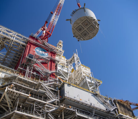 NASA’s November 2024 Highlight: A Special Lagniappe interstage simulator component suspended in air by crane