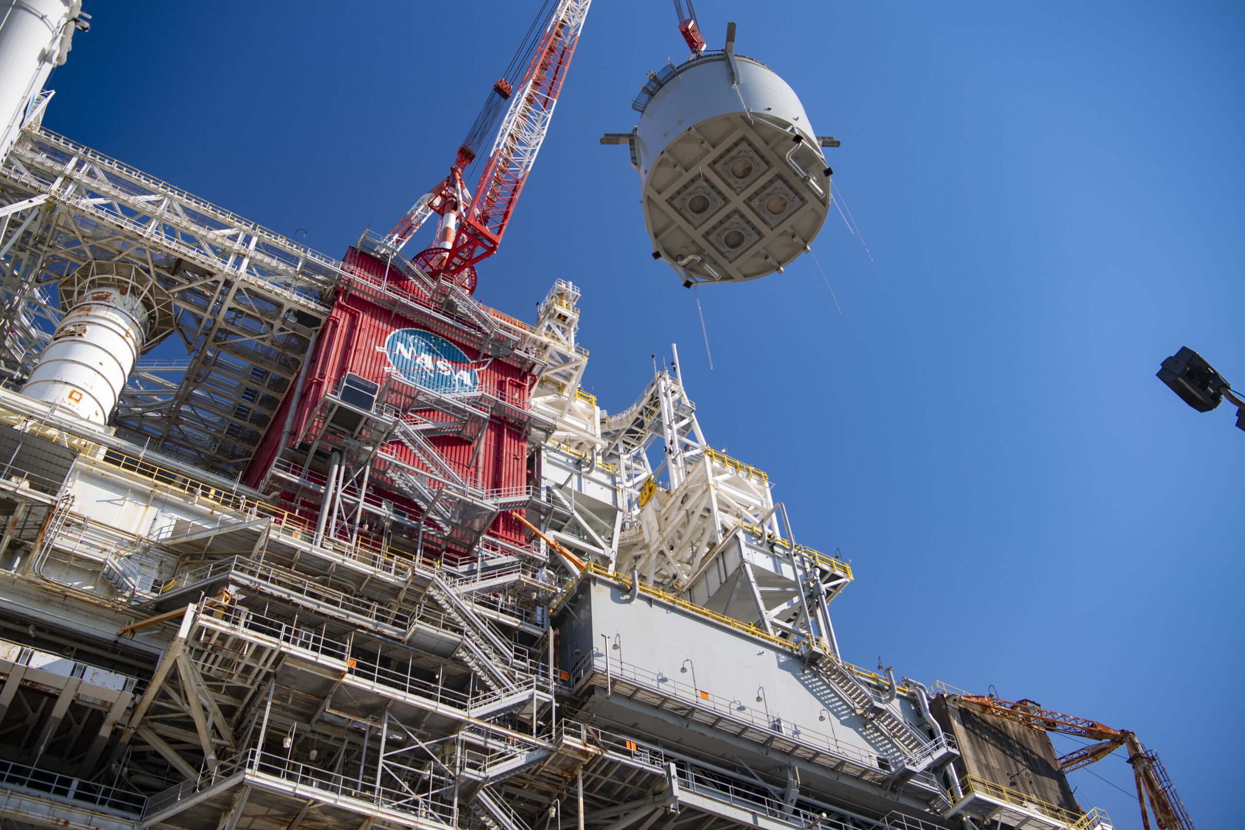 s24 049 4.jpg interstage simulator component suspended in air by crane