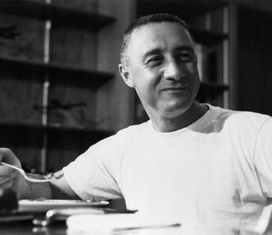 Remembering Astronaut Gus Grissom: A Space Exploration Pioneer Grissom wears a t-shirt while eating a meal after his Mercury-Redstone 4 flight.