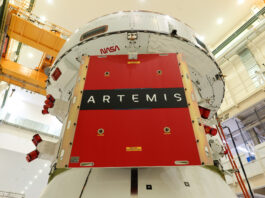 Orion’s Solar Wings Attached for NASA’s Artemis II Mission Image shows Orion spacecraft awaiting installation of four solar arrays.