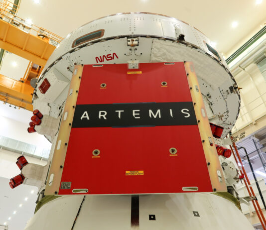 Orion’s Solar Wings Attached for NASA’s Artemis II Mission Image shows Orion spacecraft awaiting installation of four solar arrays.