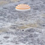 NASA Astronaut Jonny Kim, Team Back from Space Station The Soyuz MS-27 spacecraft is seen as it lands in a remote area near the town of Zhezkazgan, Kazakhstan with Expedition 73 NASA astronaut Jonny Kim, and Roscosmos cosmonauts Sergey Ryzhikov, and Alexey Zubritsky aboard, Tuesday, Dec. 9, 2025. The trio are returning to Earth after logging 245 days in space as members of Expeditions 72 and 73 aboard the International Space Station.