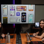 RadarFit AI Promotes Unique Healthy Habit Incentives Multiple people sitting at a table with a projector screen in the background