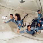 40 Years Ago: Reagan Introduces NASA’s Teacher in Space Initiative Backup Teacher in Space Barbara R. Morgan, left, prime Teacher in Space S. Christa McAuliffe, Payload Specialist Gregory B. Jarvis, and Mission Specialist Ronald E. McNair in the middeck of the Shuttle Mission Simulator