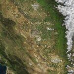 NASA Employs High-Tech Radar for California Groundwater Monitoring Satellite image of the Tulare Basin area in Southern California, showing a mix of foothills and farmlands.