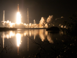 NASA Unveils New Virtual Backgrounds Celebrating Artemis Missions Framed by vegetation in the foreground and against the backdrop of a black night sky, NASA’s SLS (Space Launch System) rocket carrying the Orion spacecraft launches on the Artemis I flight test on Nov. 16, 2022, from Launch Complex 39B at NASA’s Kennedy Space Center in Florida.