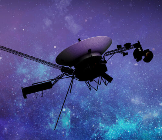 NASA Shuts Down Voyager Instruments to Prolong Mission An artist’s concept of the Voyager spacecraft, set against a starry blue and purple background.
