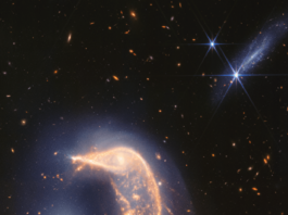 Webb Telescope Celebrates 2 Years with Stunning Galaxy Interaction Image NASA Logo