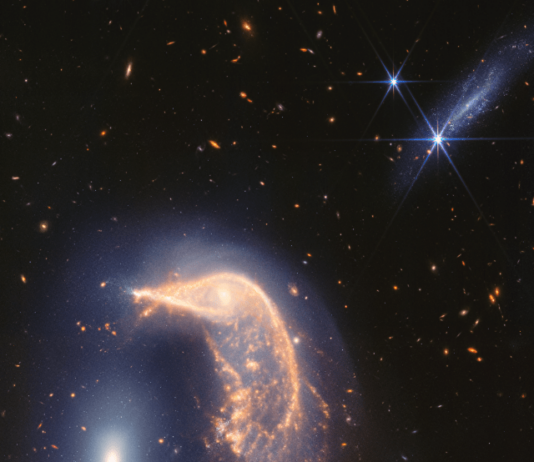 Webb Telescope Celebrates 2 Years with Stunning Galaxy Interaction Image NASA Logo