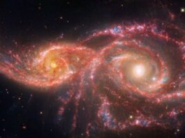 NASA’s Webb, Hubble Explore Blood-Red Galaxy Pair NASA Logo
