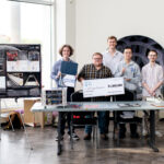 NASA’s Watts on the Moon Challenge Concludes with $1.5M Prizes At the Great Lakes Science Center in Cleveland, Ohio, Team H.E.L.P.S. (High Efficiency Long-Range Power Solution) from The University of California, Santa Barbara pose with their $1 million check and the power transmission and energy storage hardware that won them the grand prize in the four-year competition. The team is comprised of six faculty researchers at UC Santa Barbara, led by team lead Dr. Philip Lubin (far right).